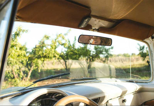 Image of a vintage car's windshield, free of chips after chip repairs.